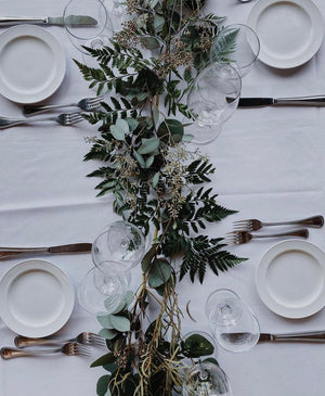 Fern and Eucalyptus garland on white table cloth