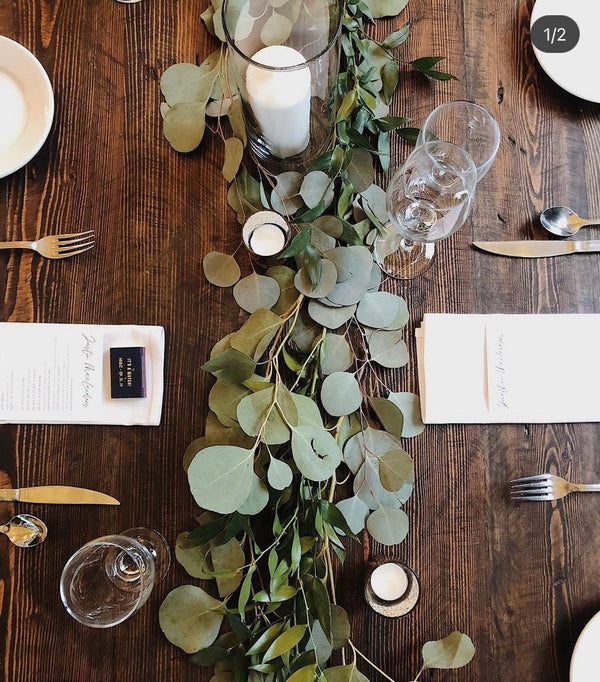Ruscus and Eucalyptus garland on wood table