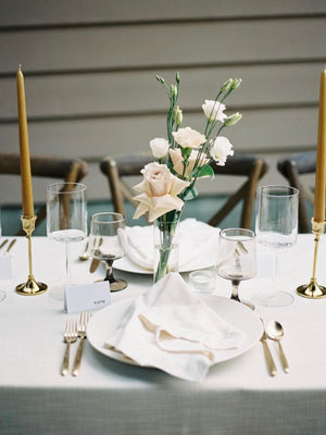 Bud Vase arrangement in clear glass vase with white and green blooms wedding