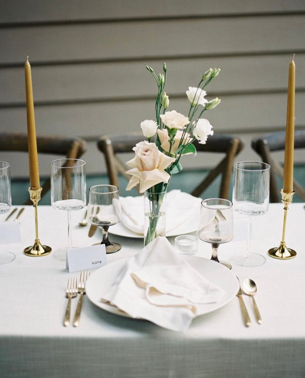 Bud Vase arrangement in clear glass vase with white and green blooms wedding