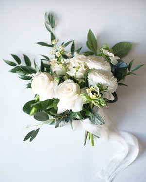 bridesmaid bouquet with white roses and lush greenery wedding flowers vancouver olfco our little flower company
